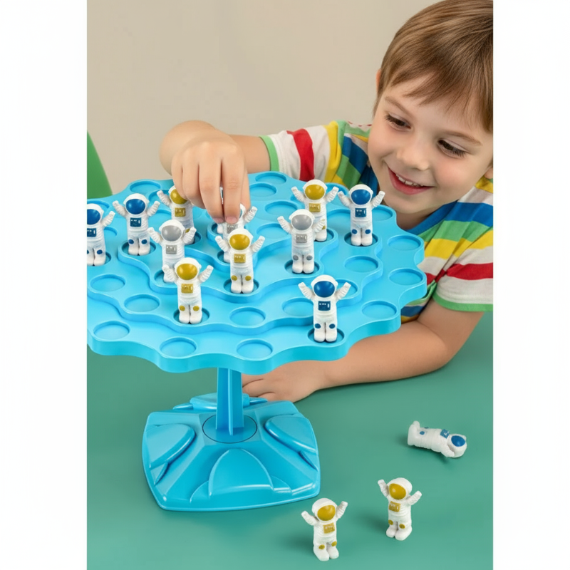 Child placing an astronaut figure on the blue tree-shaped balancing board