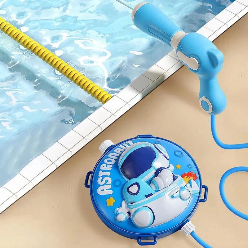 Blue astronaut water tank and hose-connected water gun beside a swimming pool