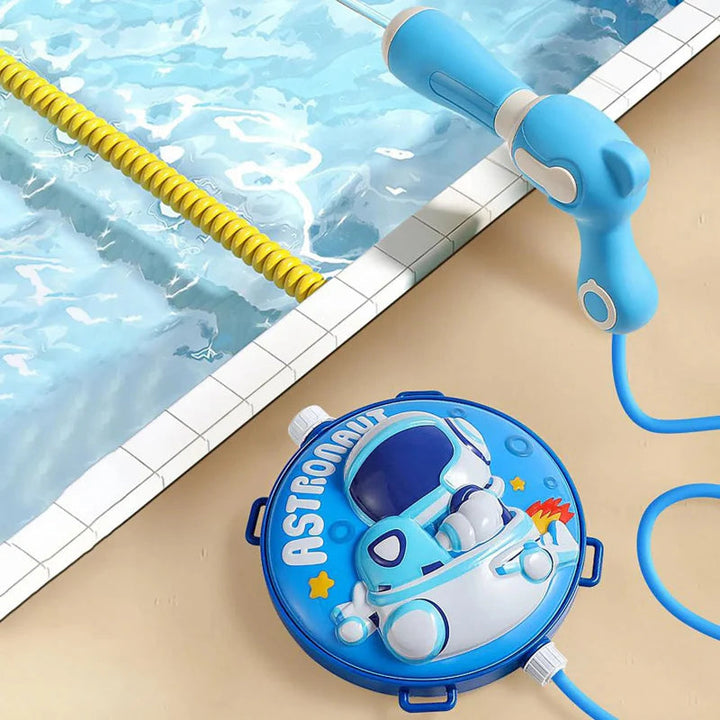 Blue astronaut water tank and hose-connected water gun beside a swimming pool