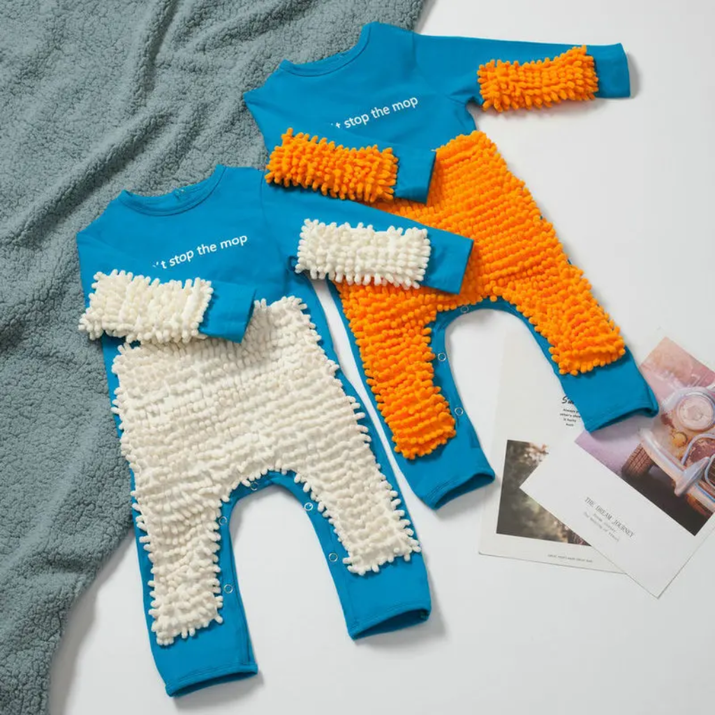 Two blue baby jumpsuits with white and orange cleaning-fiber panels
