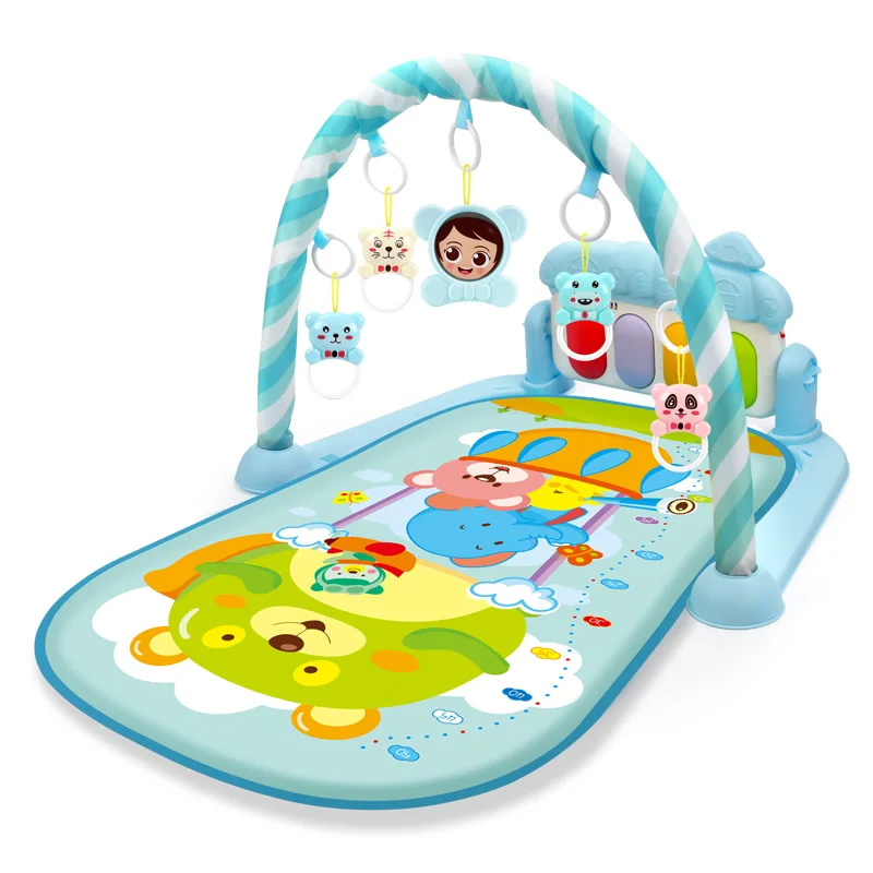 Blue baby gym with balloon and animal illustrations on the play mat