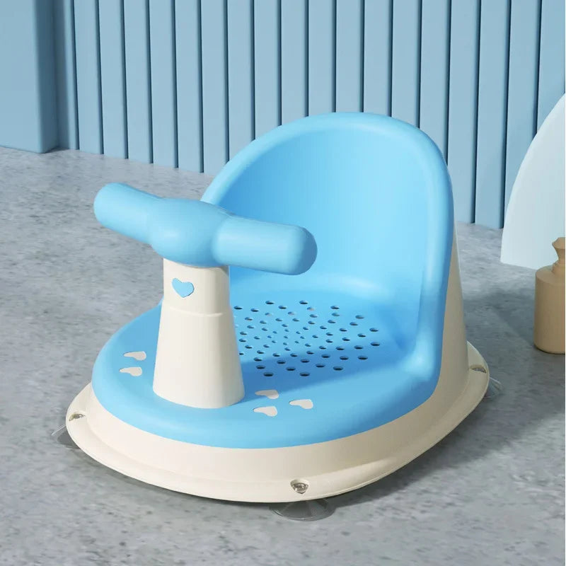 Blue baby bath seat with a curved backrest, front support bar and cream-colored base