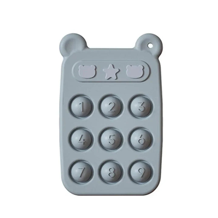 Blue silicone teething phone with nine numbered buttons and bear-ear corners