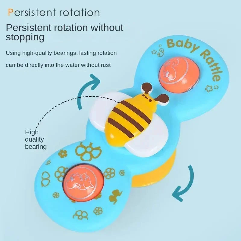 Blue bee bath spinner with arrows demonstrating rotation around its yellow-and-black center.