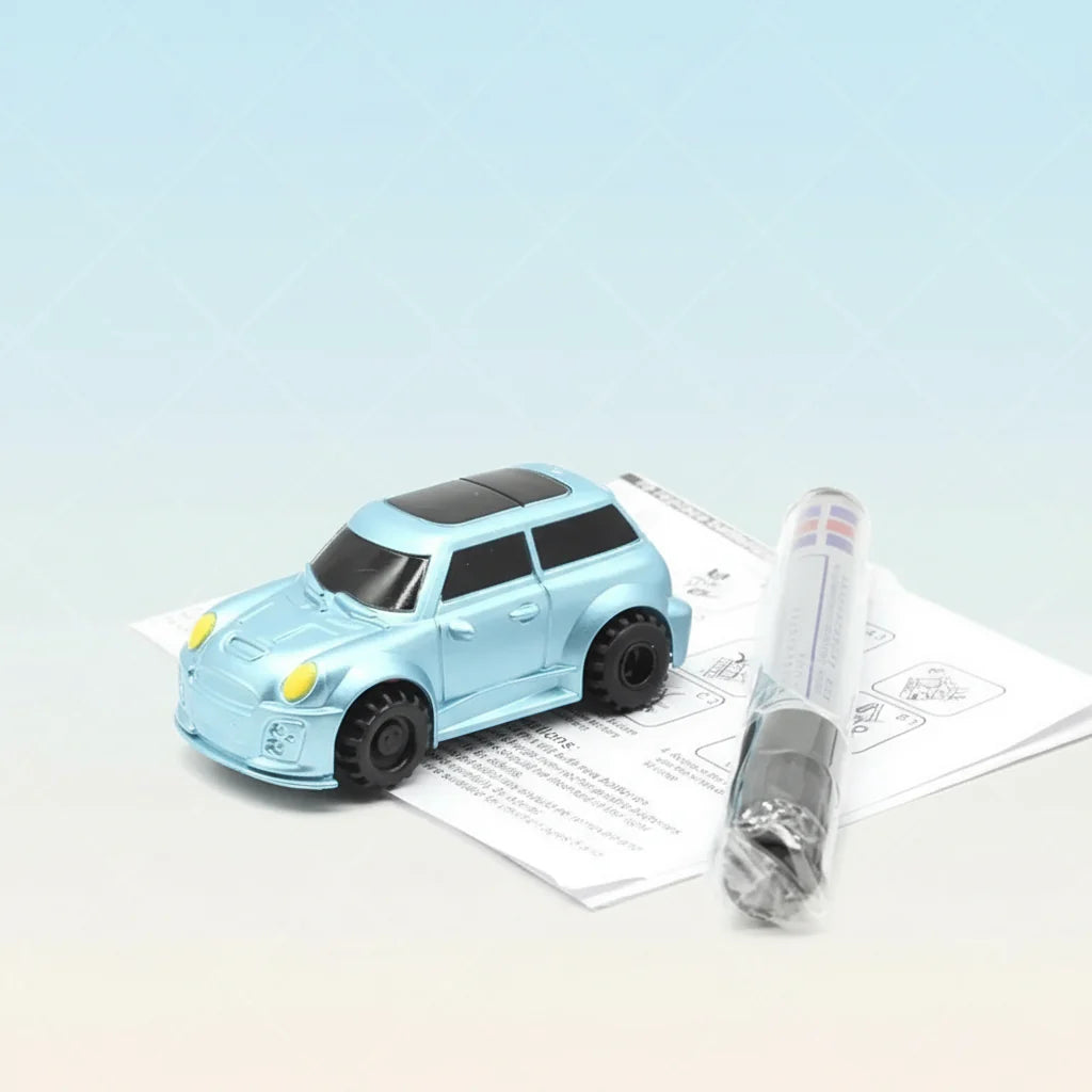 Blue compact toy car with a drawing pen and instruction sheet