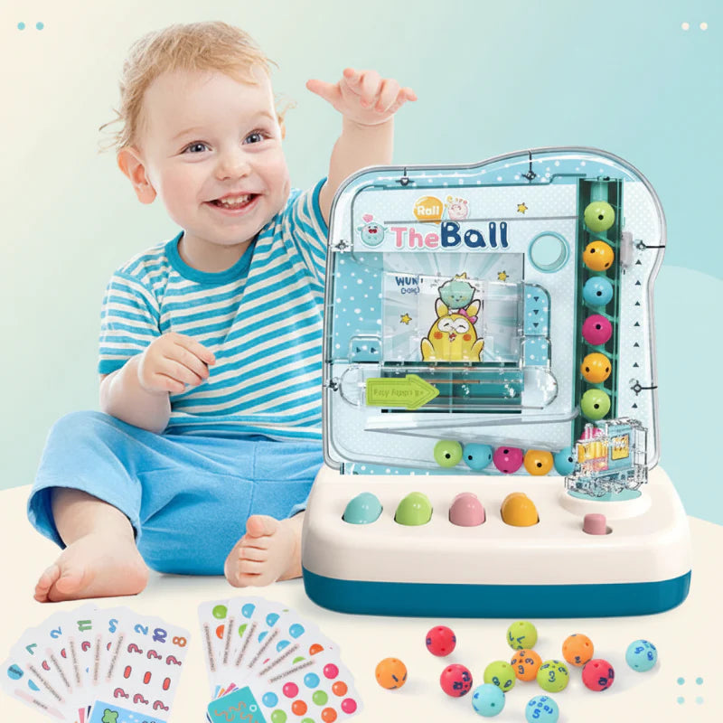 Child seated beside a blue math track game with activity cards and colored counting balls