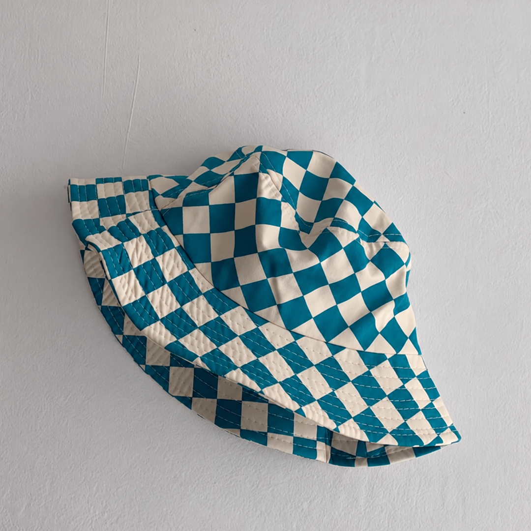 Blue-and-cream checkered bucket hat with a stitched, downward-sloping brim