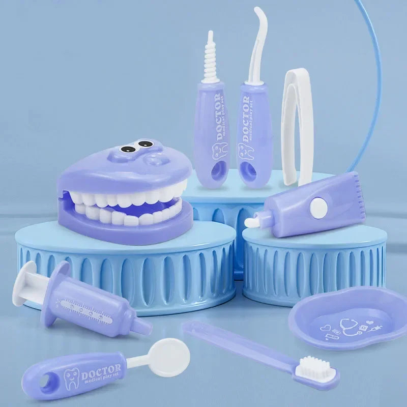 Blue tooth model and dental play tools arranged on blue display stands