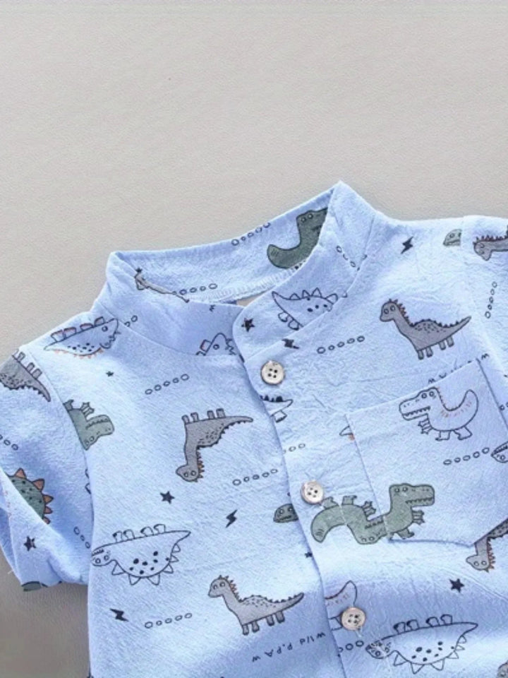 Close-up of the blue dinosaur shirt&