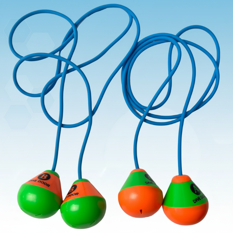 Four blue loop diving toys with green-and-orange ends against a pale blue background