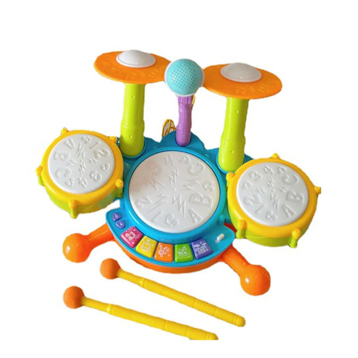 Blue toy drum set with three drum pads, two cymbals, a microphone and two yellow drumsticks