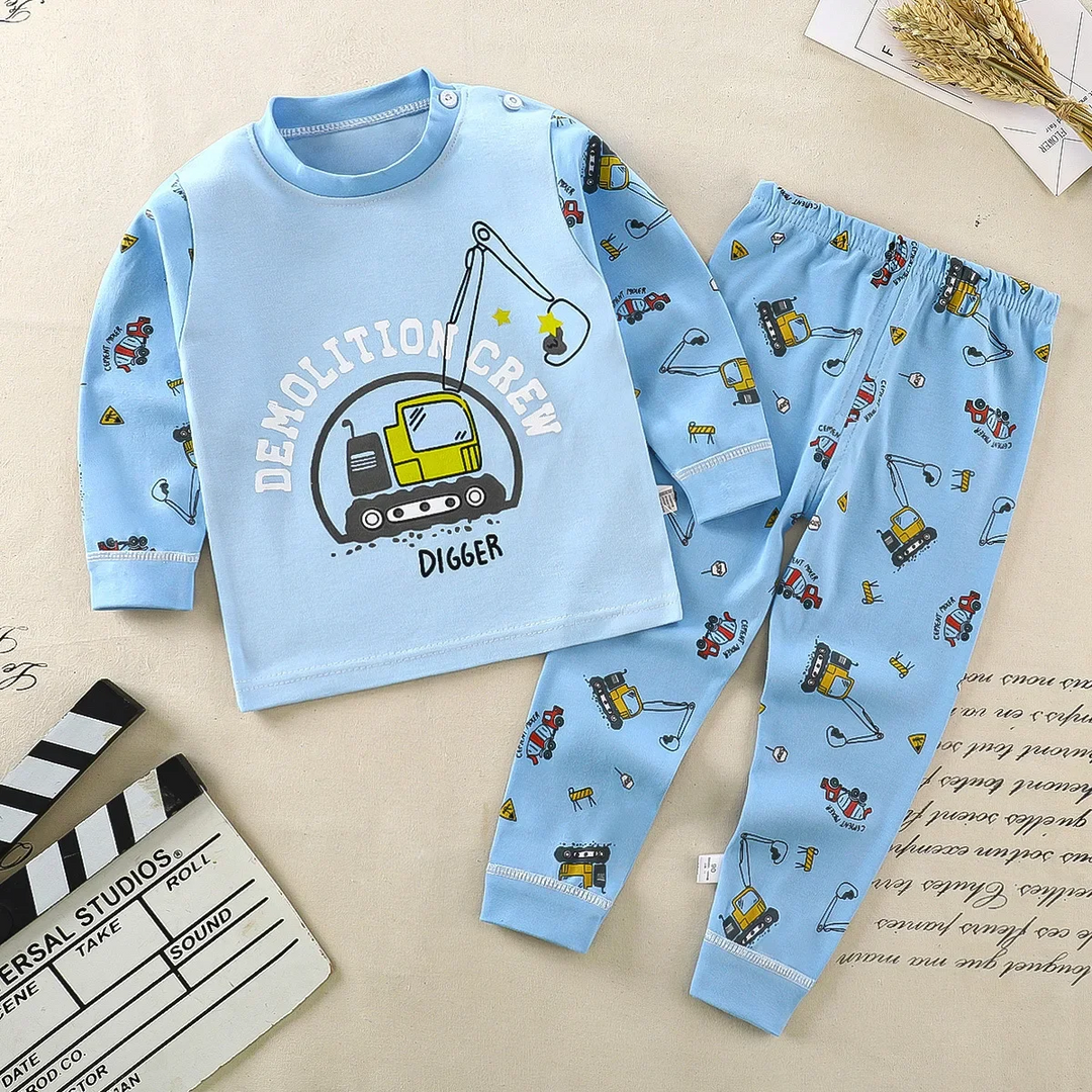Light blue excavator pajama top with matching construction-vehicle print pants