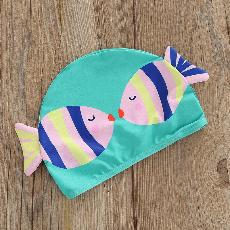 Blue swim cap with two colorful striped fish and decorative side fins