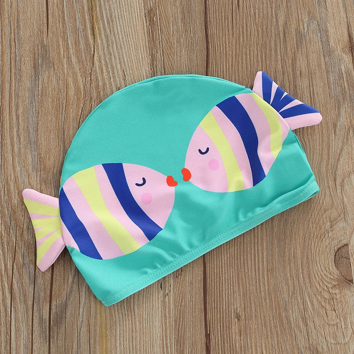 Blue swim cap with two colorful striped fish and decorative side fins