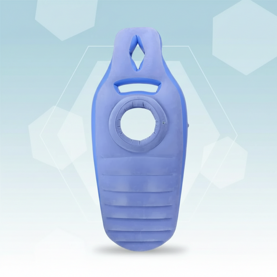 Front view of a blue inflatable pregnancy pillow with a circular belly opening