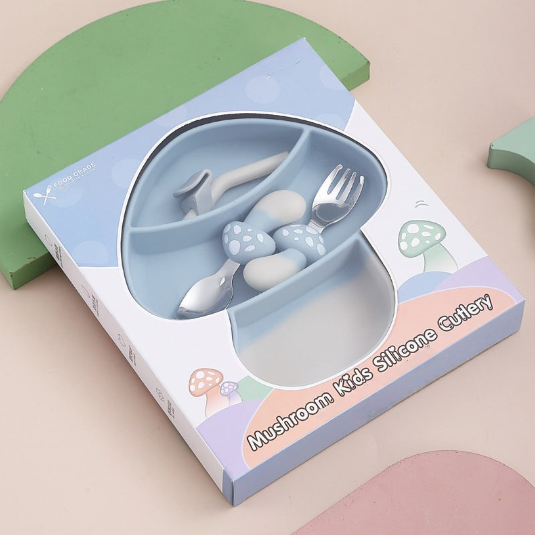 Blue-gray mushroom-shaped divided plate and matching cutlery in a windowed box