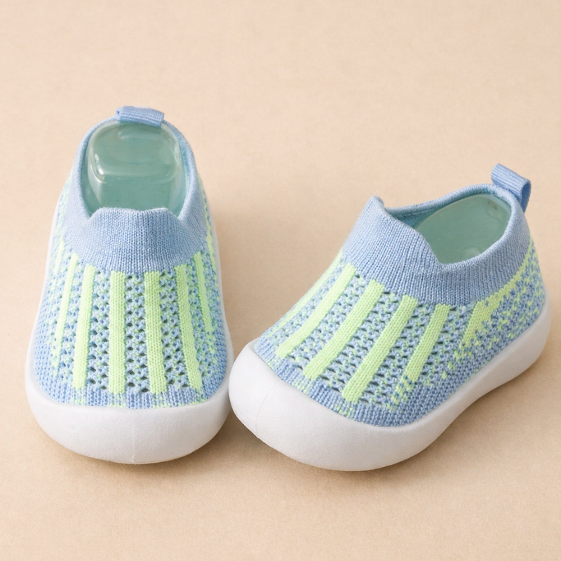 Blue mesh sneakers with light green vertical stripes and white soles.