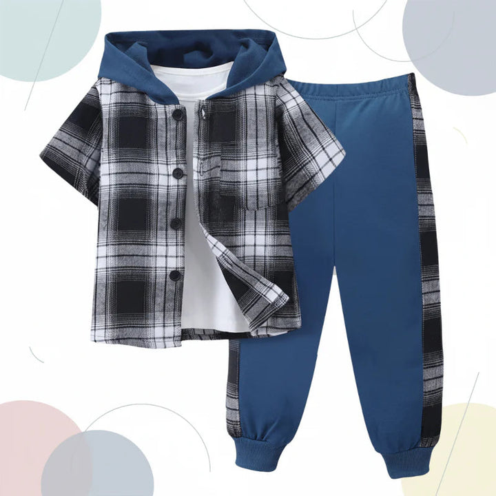 Black and white plaid top with a blue hood and blue pants with plaid side stripes