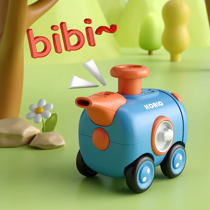 Blue and orange koala toy train shown beside a whistle sound graphic.