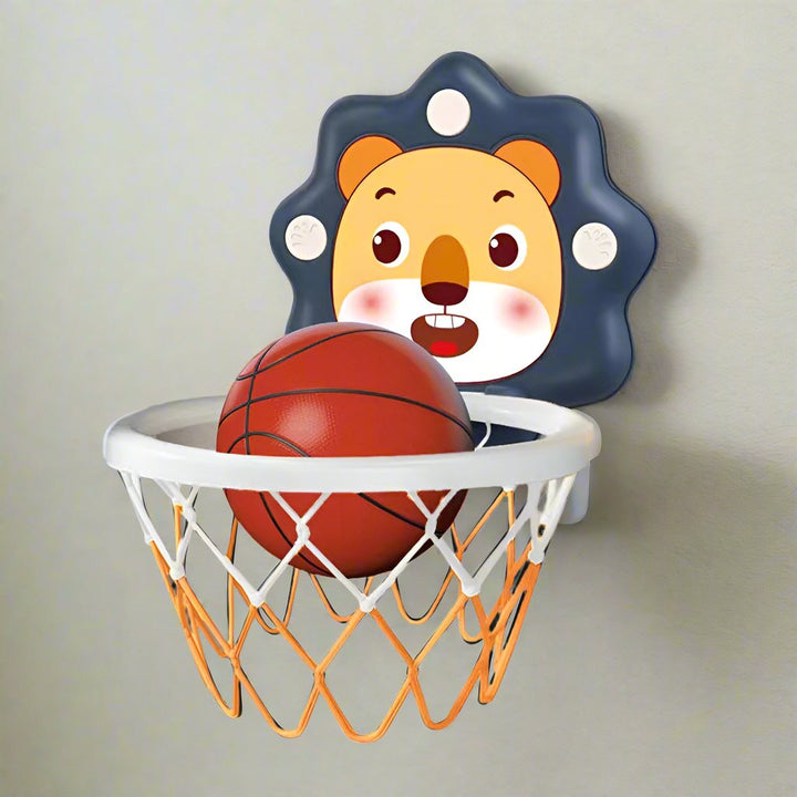 Blue lion basketball hoop mounted on a wall with a red ball resting in the rim