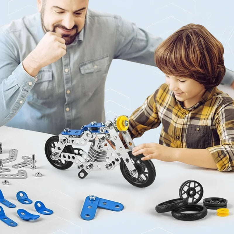 An adult and child assembling a blue and silver motorcycle with loose parts and tools