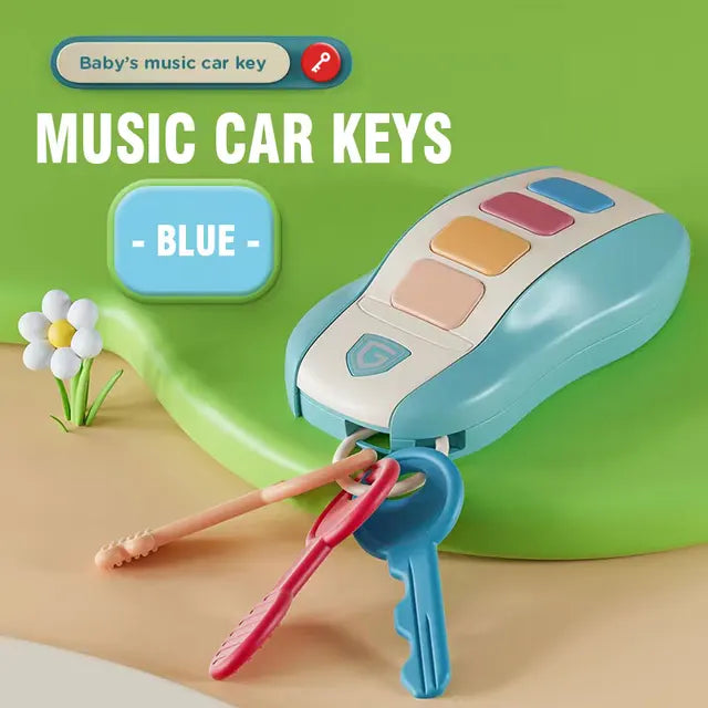 Blue musical key fob with four colored buttons and three hanging toy keys