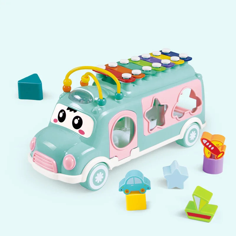 Blue musical toy bus with roof keys, curved bead tracks, and colorful sorting blocks