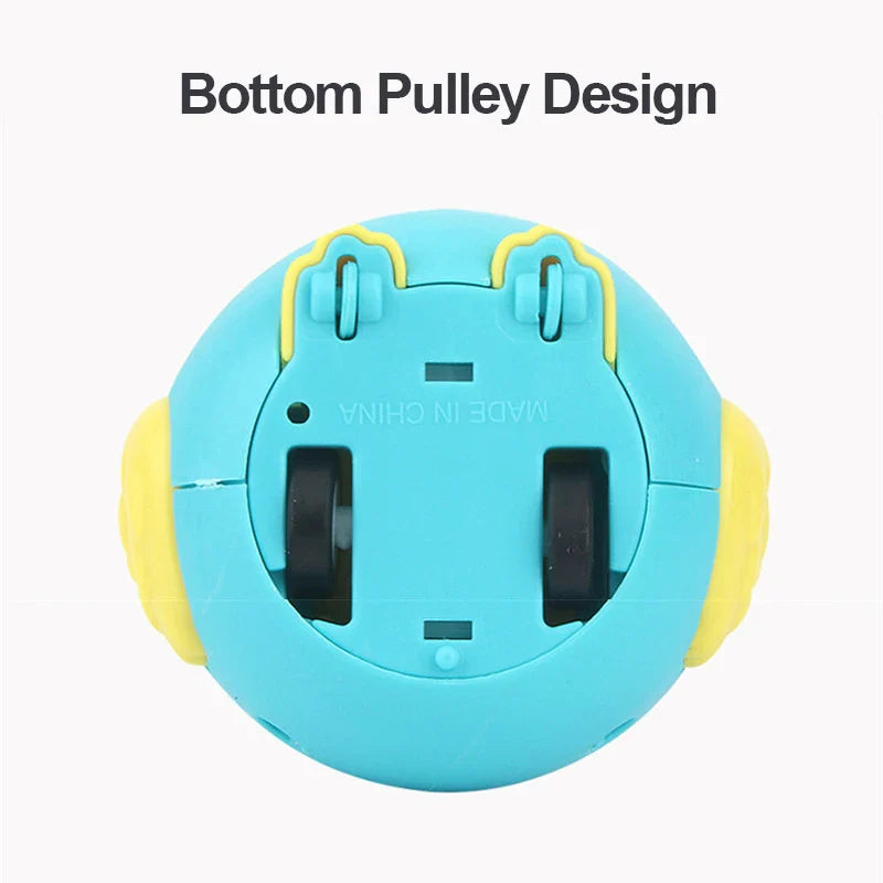 Underside of the blue owl toy car showing its two black rolling wheels.