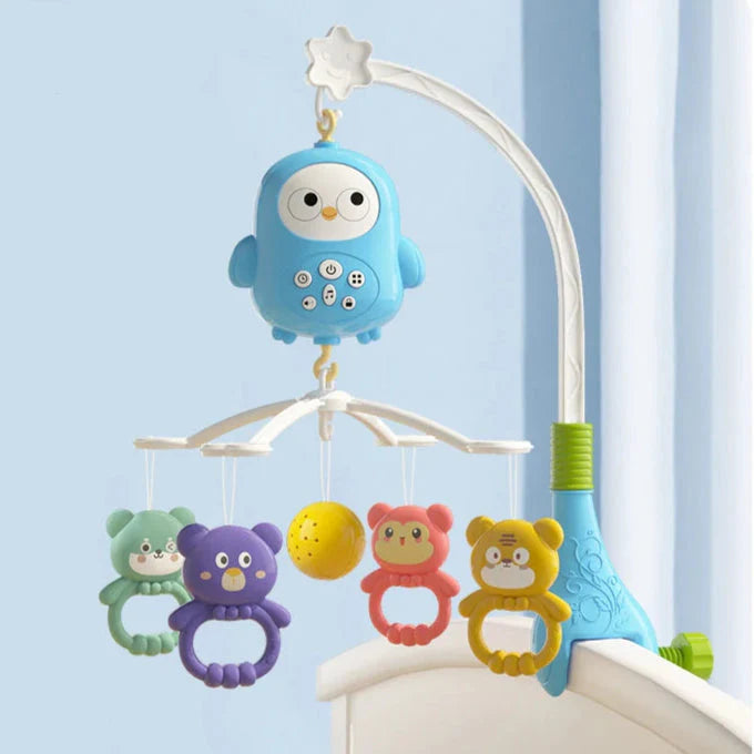 Blue owl crib mobile with a white curved arm, colorful hanging animals, and a yellow ball.