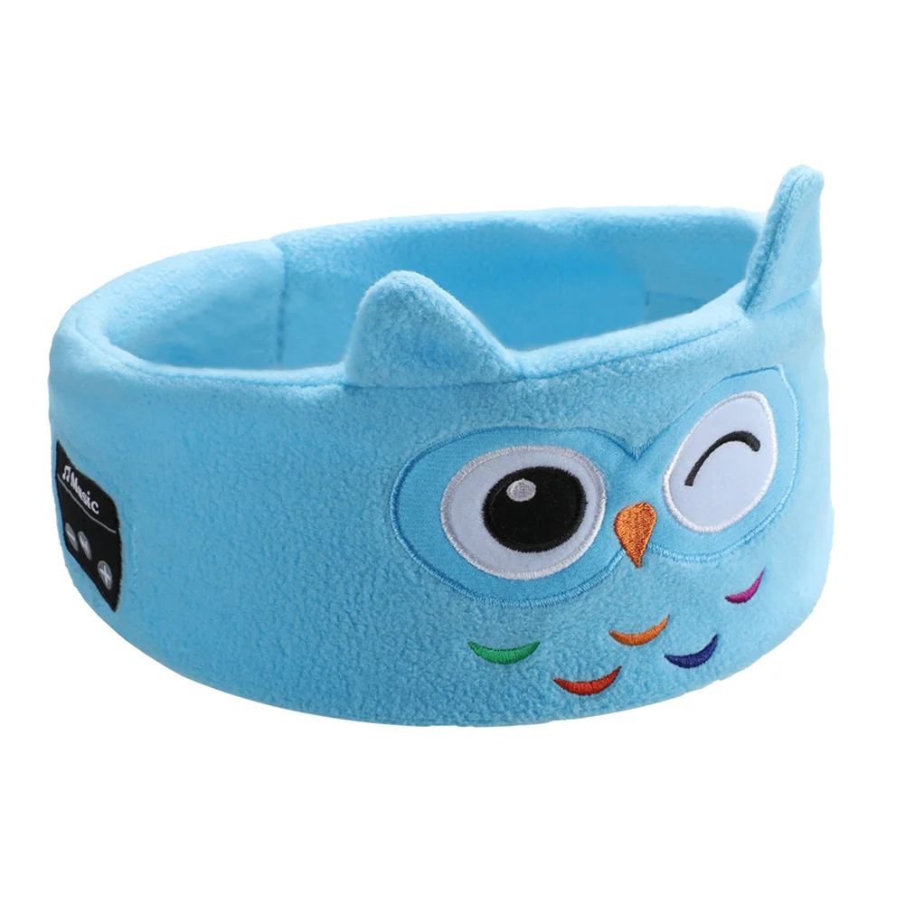 Blue owl Bluetooth sleep mask with a winking eye and colorful embroidered feathers.