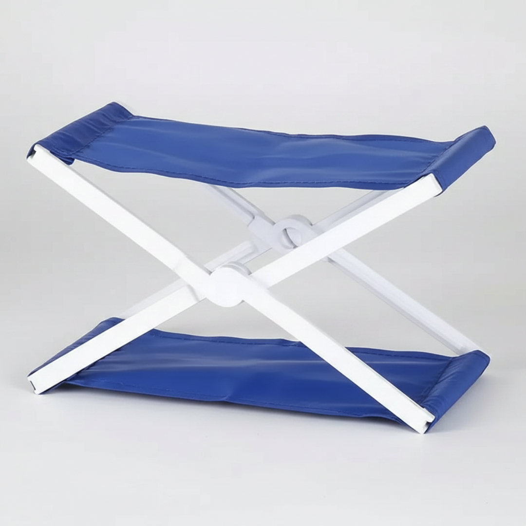 Blue Oxford fabric headrest opened on a white cross-frame against a light background