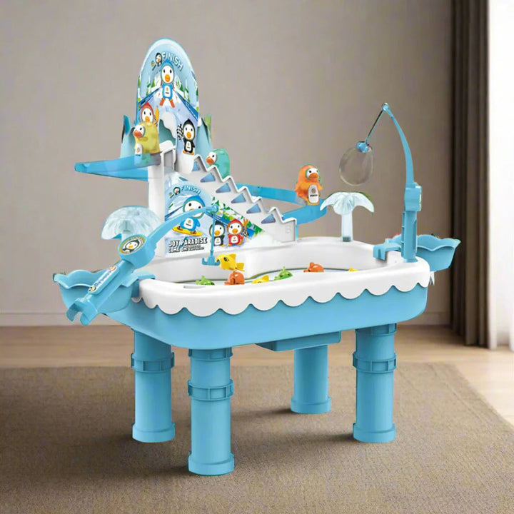 Blue penguin fishing playset with a staircase and slide, displayed on a rug