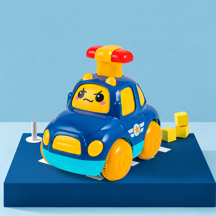 Blue toy police car with yellow wheels, a roof-mounted button, and a cartoon windshield face.