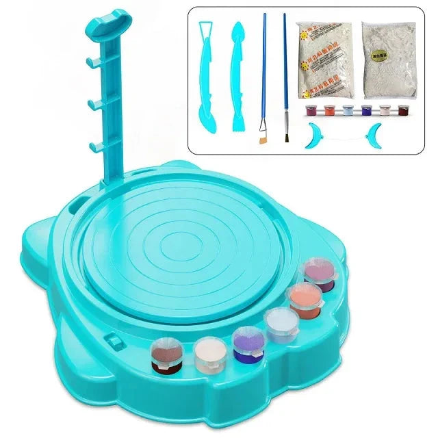 Blue pottery wheel set with paint pots, sculpting tools, brushes and clay shown in an inset