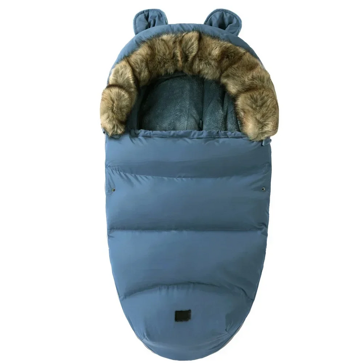 Blue quilted stroller footmuff with a faux fur collar and small matching ears
