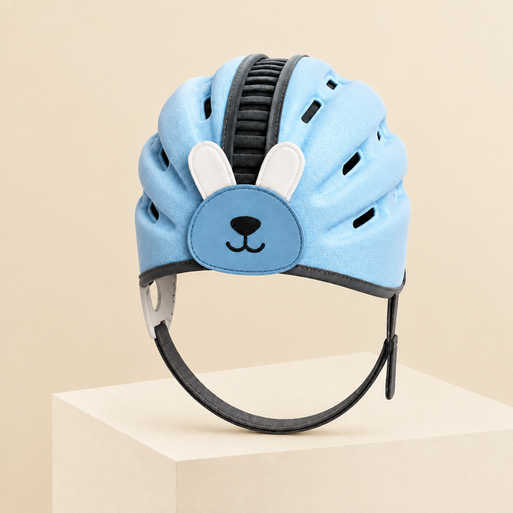 Blue rabbit headguard with long ear details and a chin strap