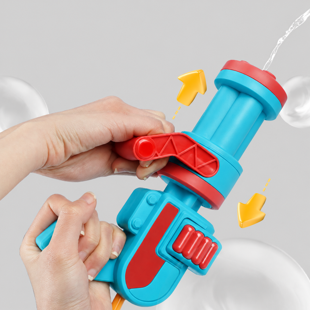 Hands operating a blue-and-red water blaster as water sprays from the nozzle