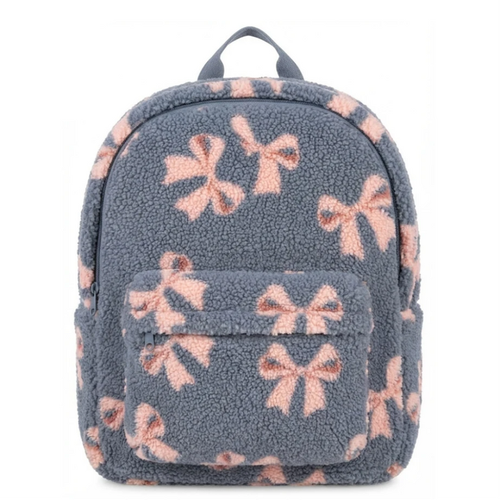 Front view of the blue teddy backpack with pink ribbons and a zippered front pocket