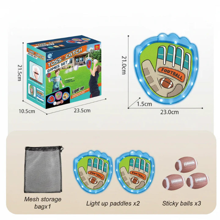 Blue rugby-style catch set with two paddles, three oval balls, and a mesh bag
