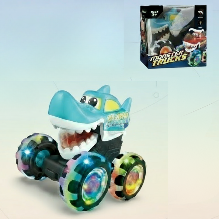 Blue shark monster truck with glowing wheels and its retail box in the background