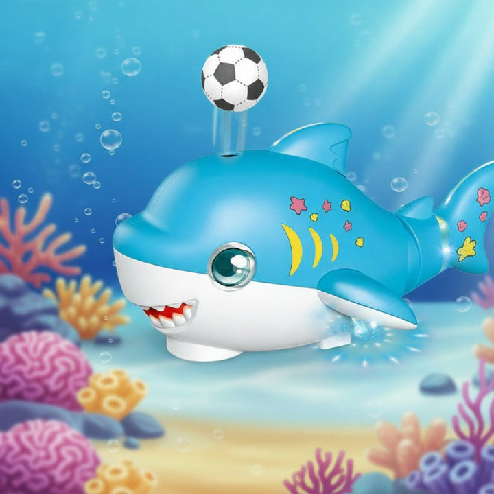 Blue shark toy with a floating soccer-style ball, star details, and an illustrated underwater backdrop