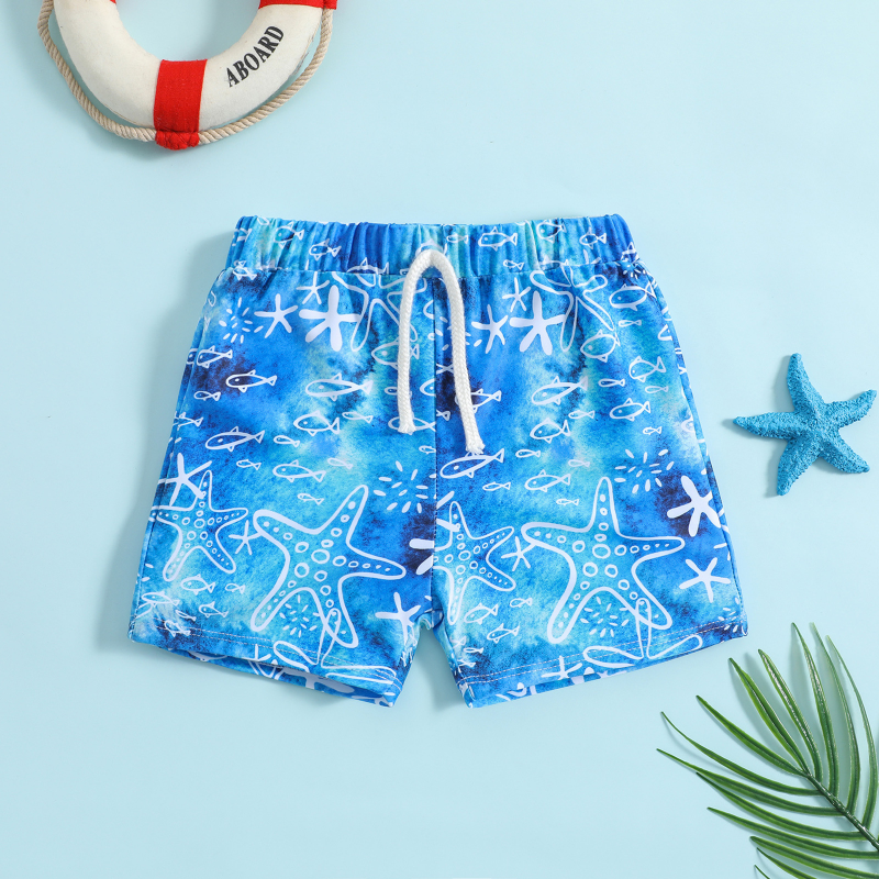 Blue swim trunks with white starfish and fish outlines and an elastic drawstring waist