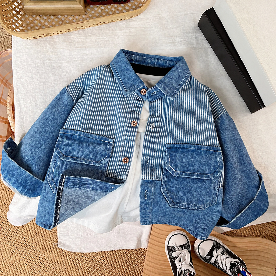 Blue denim jacket with striped panels and flap pockets layered over a white T-shirt.