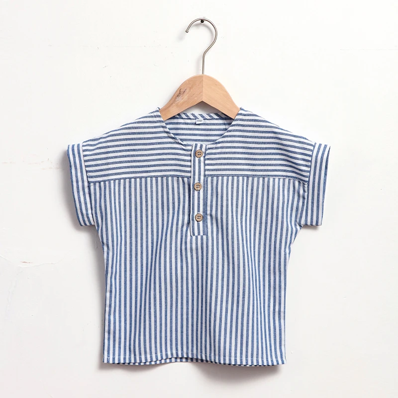 Front view of the blue striped shirt on a wooden hanger