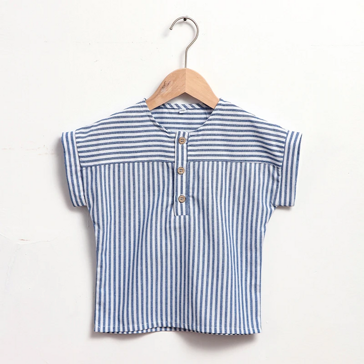 Front view of the blue striped shirt on a wooden hanger
