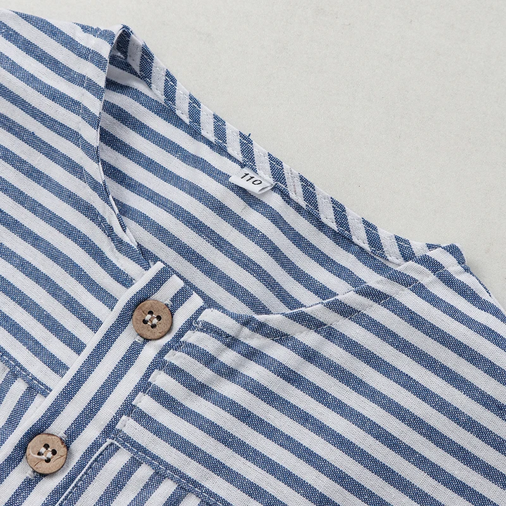 Round neckline and upper button placket on the blue striped shirt
