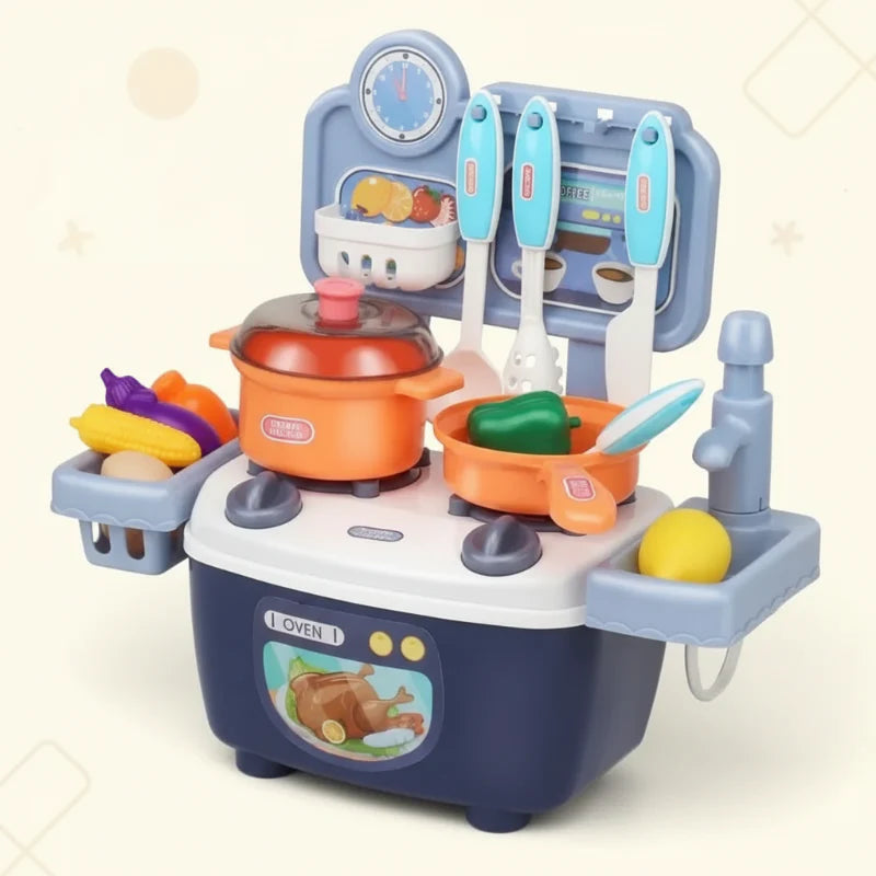 Blue tabletop play kitchen with cookware, hanging utensils, toy vegetables, and a sink