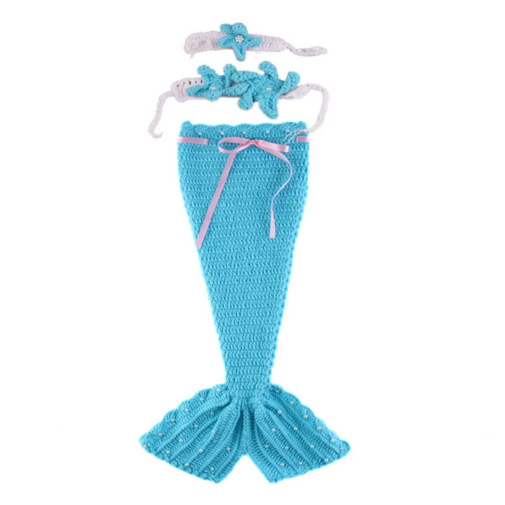 Blue three-piece baby mermaid costume with a wide-fin tail, starfish top, and headband
