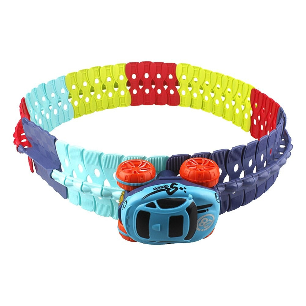 Blue toy car attached upside down to an upright ring of multicolor track