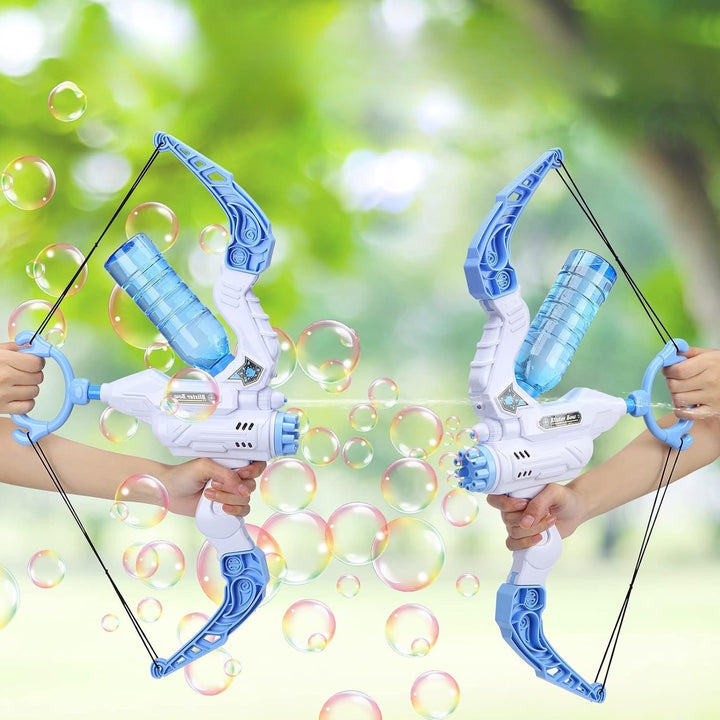 Two blue-and-white bow-shaped bubble and water toys held outdoors among bubbles
